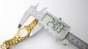 Digital caliper measuring the case diameter of the Certina DS watch, showing 24.03 mm.