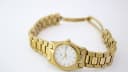 Full view of the Certina DS gold tone watch with bracelet unclasped, displaying the dial and entire bracelet.
