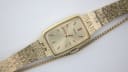 Close-up angled view of the Seiko 11-4860 dial and a portion of the textured bracelet.