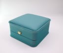 Closed view of the green leatherette display box.