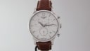 Tissot T063617A watch with white dial and silver case, 2010s