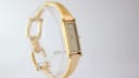 Another angled view of the Gucci 1500L watch, highlighting the dial and the elegant design of the bracelet.