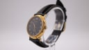 Opposite side angled view of the Ingersoll watch, highlighting the case profile and black leather strap.