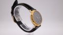 Close-up of the black dial of the Ingersoll watch, showing white Arabic numerals and date window at 3 o'clock.