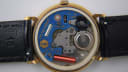 Close-up of the Cattin France Thinline quartz movement inside the Ingersoll watch case, showing components and markings.