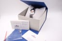 The Tissot L730K watch in its original box, alongside the original guarantee and instruction papers.