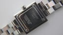 Detailed view of the Tissot L730K case back, engraved with 'Water resistant 30M, Sapphire Crystal, Stainless Steel' and model L730K.