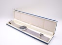 The Cerruti 1881 watch inside its original blue and off-white presentation box.