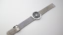 Overhead view of the Cerruti 1881 watch lying flat, showing the full mesh bracelet.