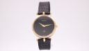Gucci 2000 M watch with black dial and gold case, 1980s