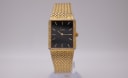 Limit V120/947A watch with black dial and gold case, 1990s