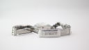 Interior view of the open Eterna signed clasp and the links of the steel bracelet.