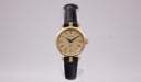 Gucci watch with champagne dial and gold case, 1990s