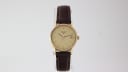 Longines L4.135.2 watch with cream dial and gold case, 1990s