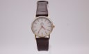 Bulova watch with white dial and two-tone case, 1990s