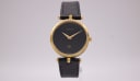 Gucci watch with black dial and two-tone case, 1990s