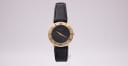 Gucci 3000.2.L watch with black dial and gold case, 1990s