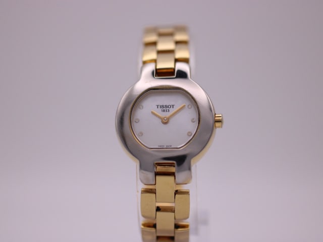 TISSOT G330 — photo 1