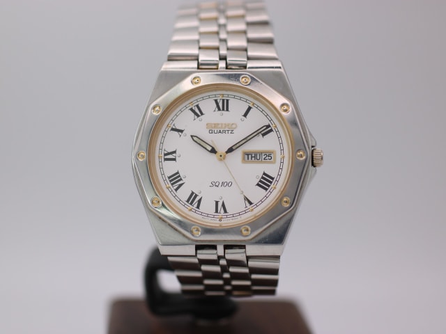 Seiko SQ 100 5Y23-8200 photo 1