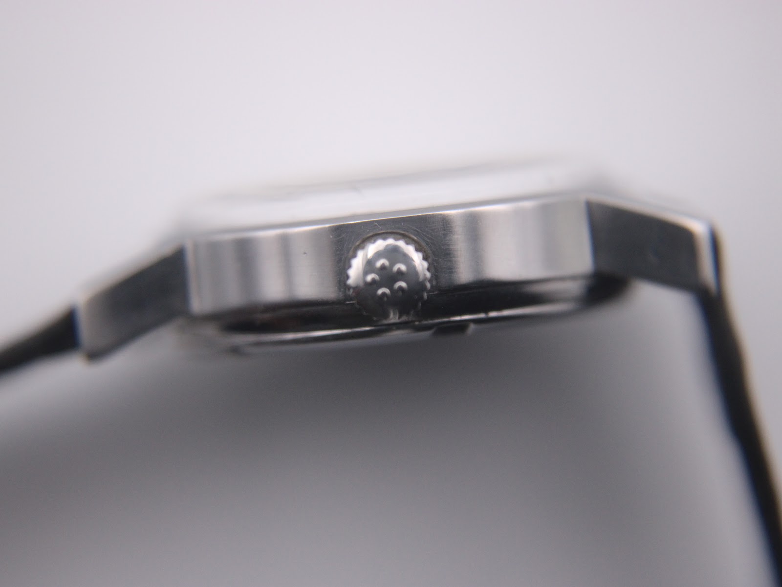 Digital caliper measuring the Eterna watch case diameter at 25.86mm.