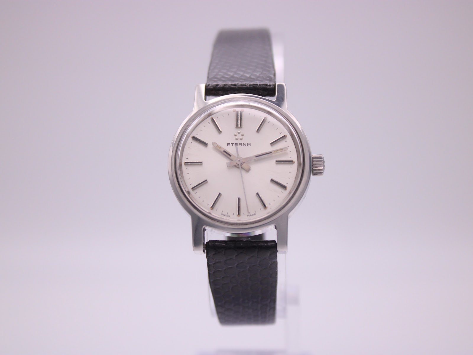 Side profile of the Eterna watch, showing the crown and case thickness.