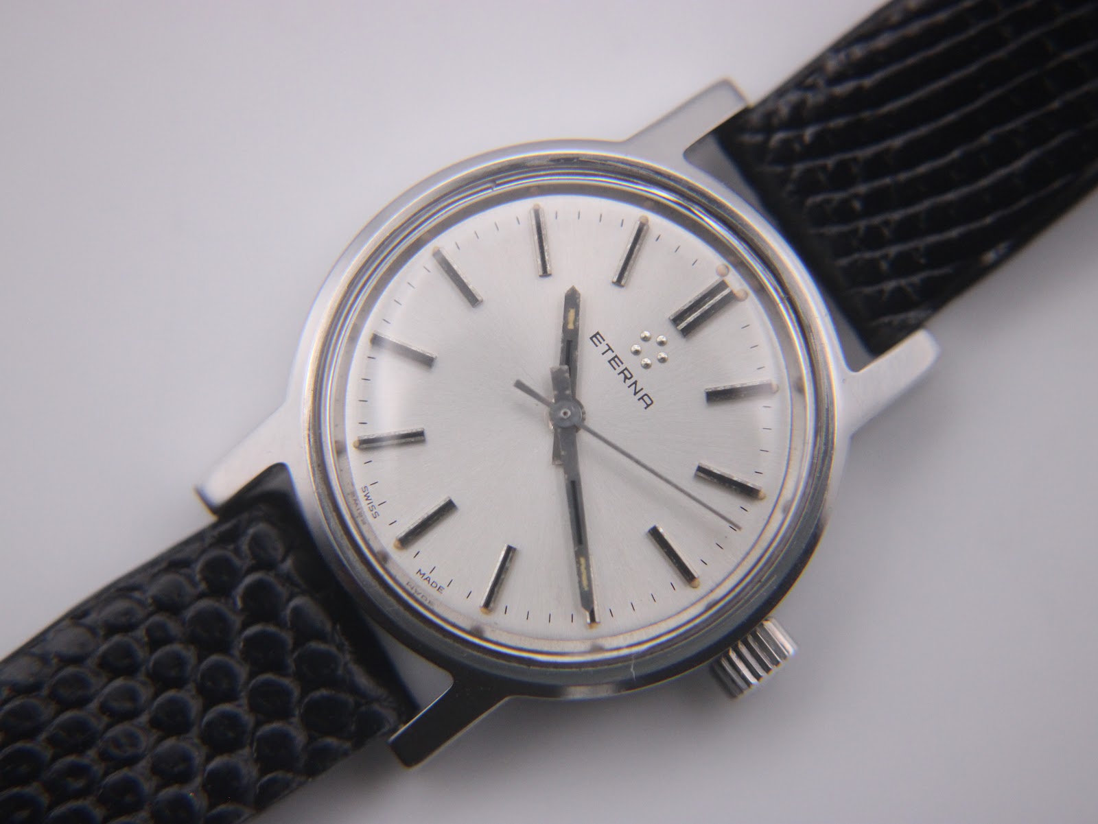 Close-up of the Eterna watch case back with model number "348 2072 41" engraved.