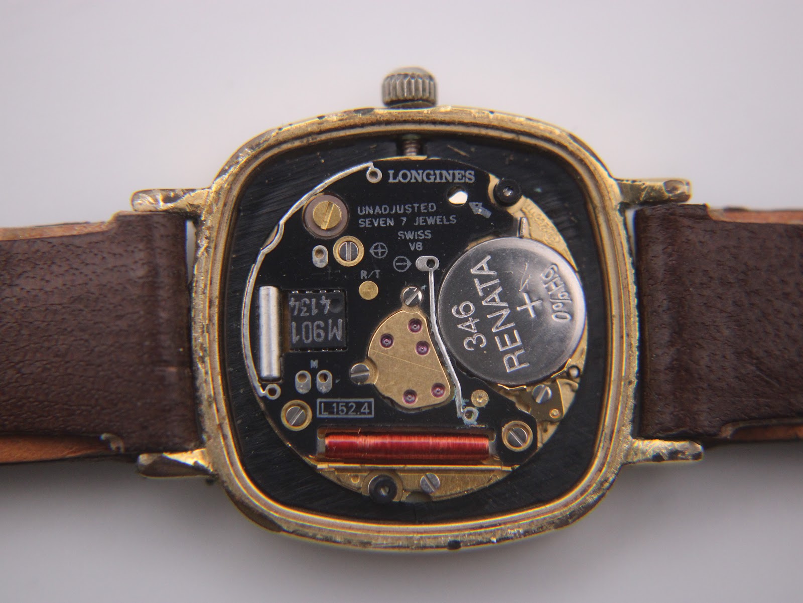 Interior view of the Longines Presence watch movement, showing the L152.4 calibre, Renata battery, and 'Swiss VB' markings.