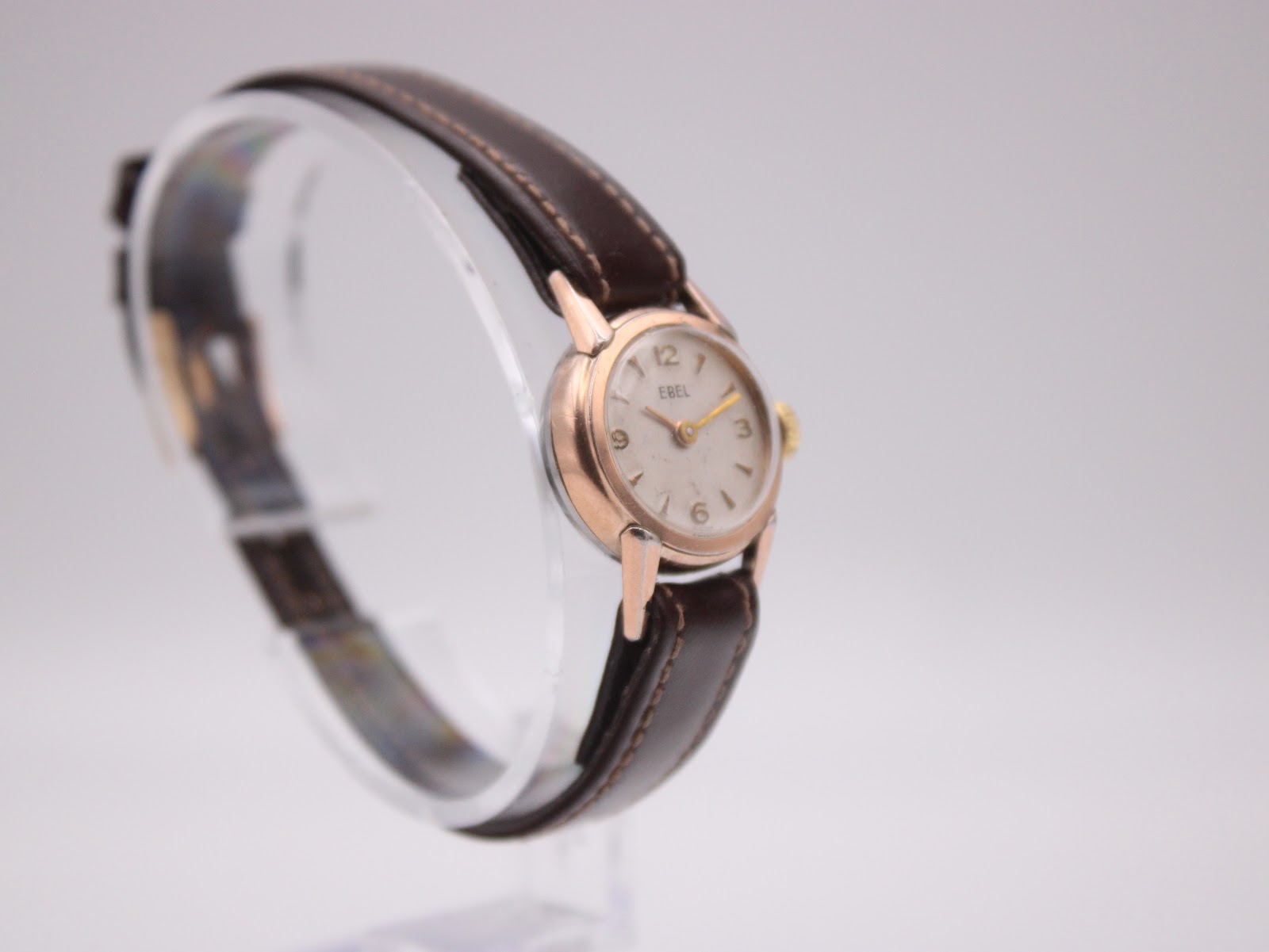 Another angled side view of the EBEL watch, showing its slim profile and lug design.