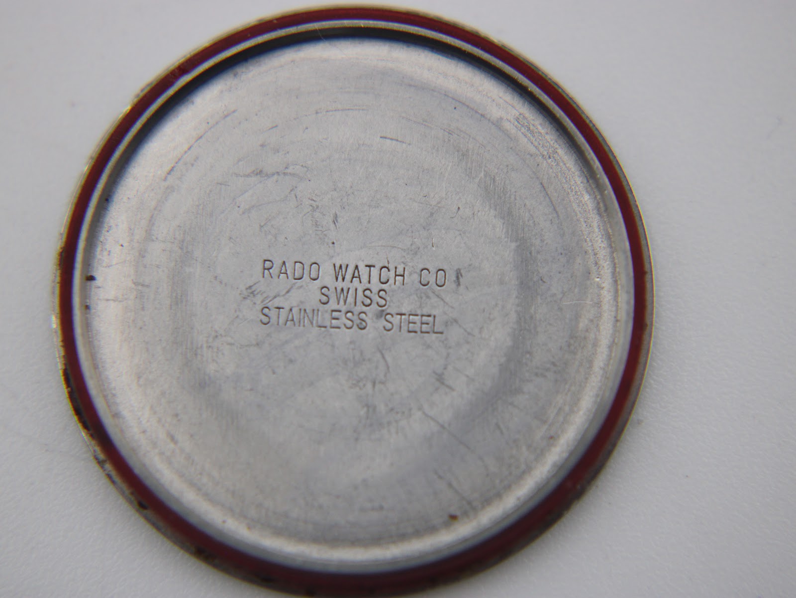 Close-up internal view of the Rado quartz movement with Renata 371 battery and Swiss markings.