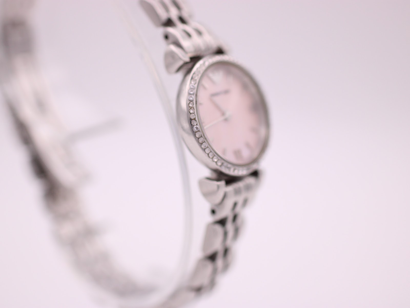 Another side profile view of the Emporio Armani AR-1781 watch, highlighting the link bracelet design and the rounded case.