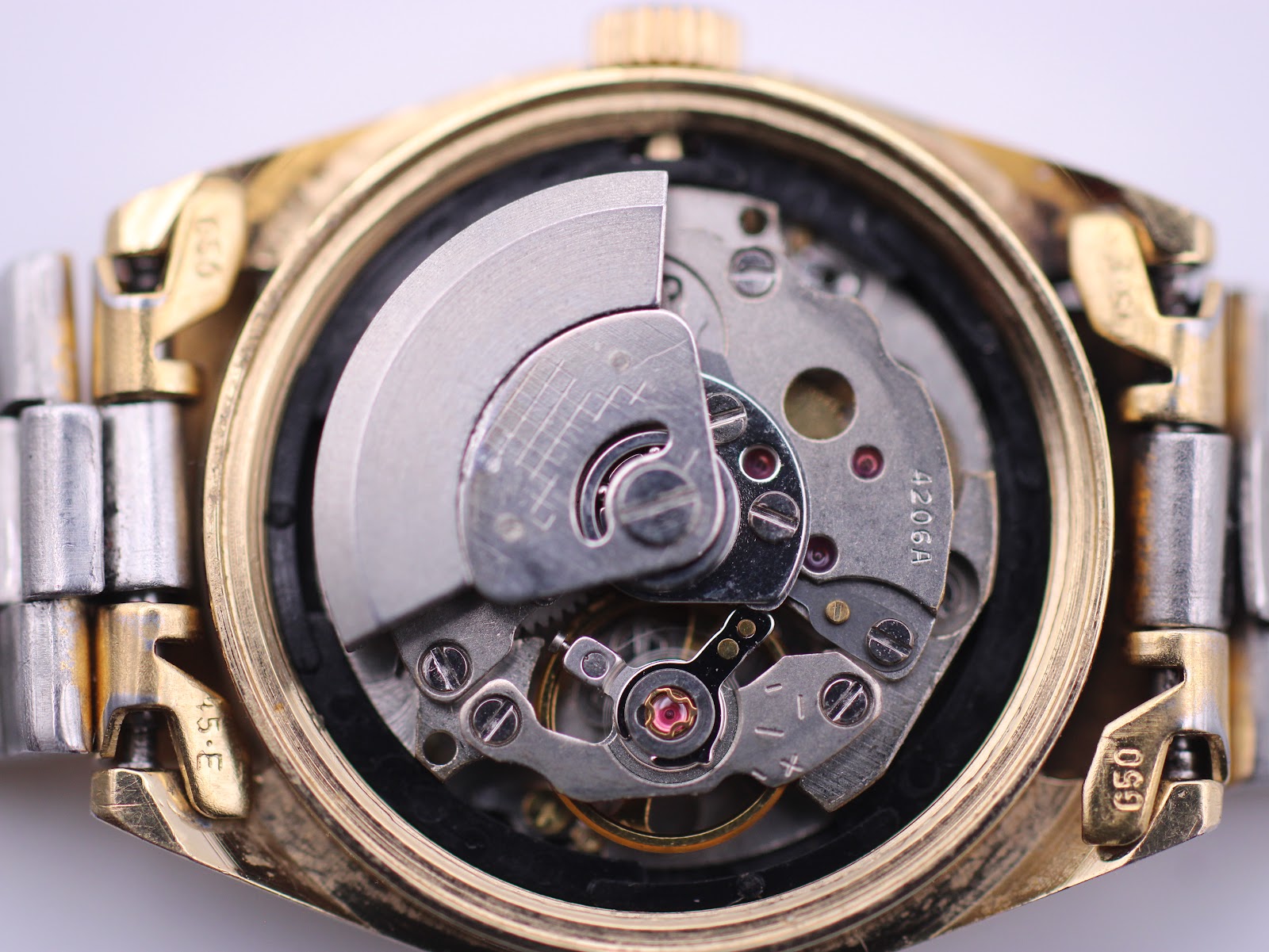 Macro shot of the Seiko 4206A automatic movement visible inside the open case.