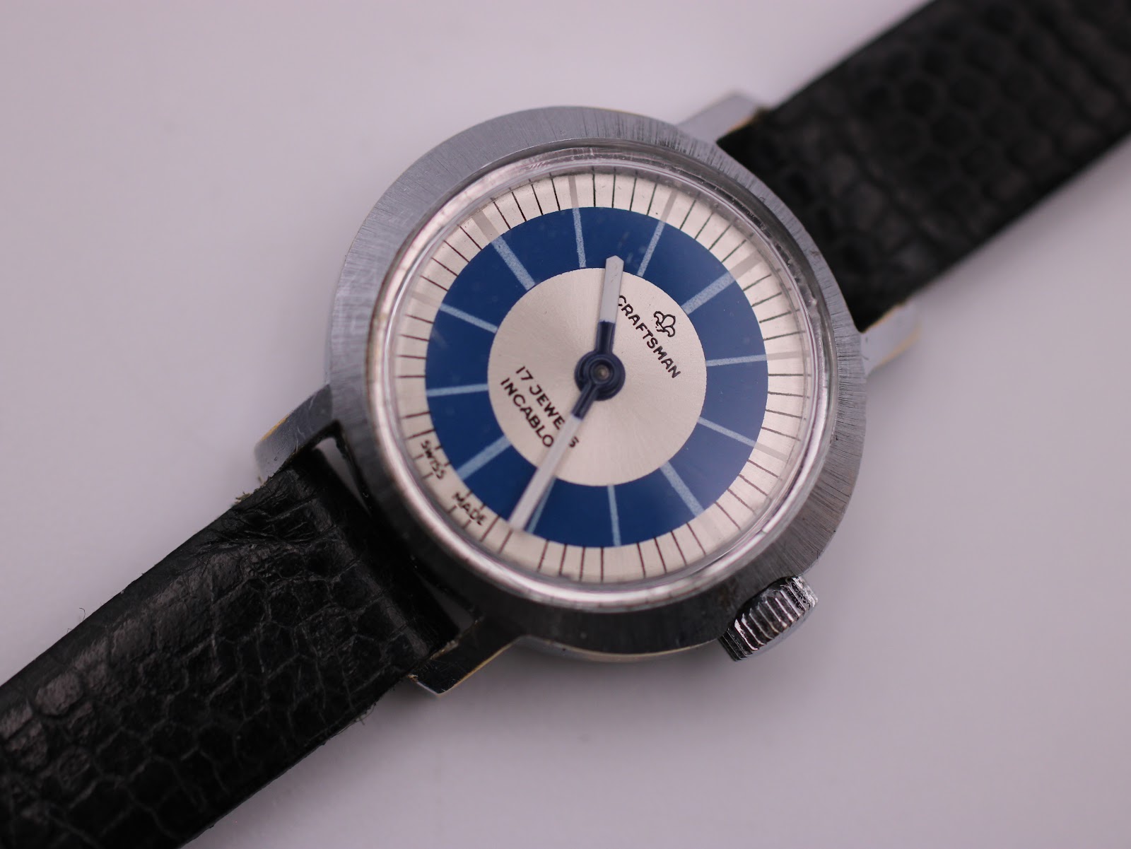 Close-up front view of the Craftsman watch dial, detailing the 'CRAFTSMAN', '17 Jewels Incabloc', and 'Swiss Made' text.