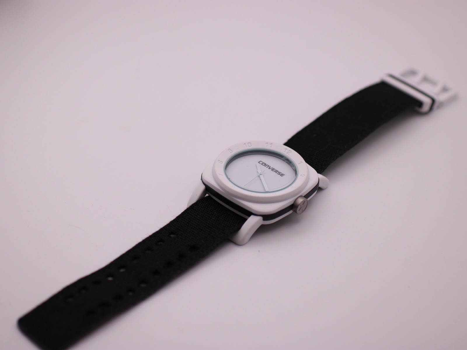 Full length view of the Converse VRQ22 on its black NATO strap, against a white background.