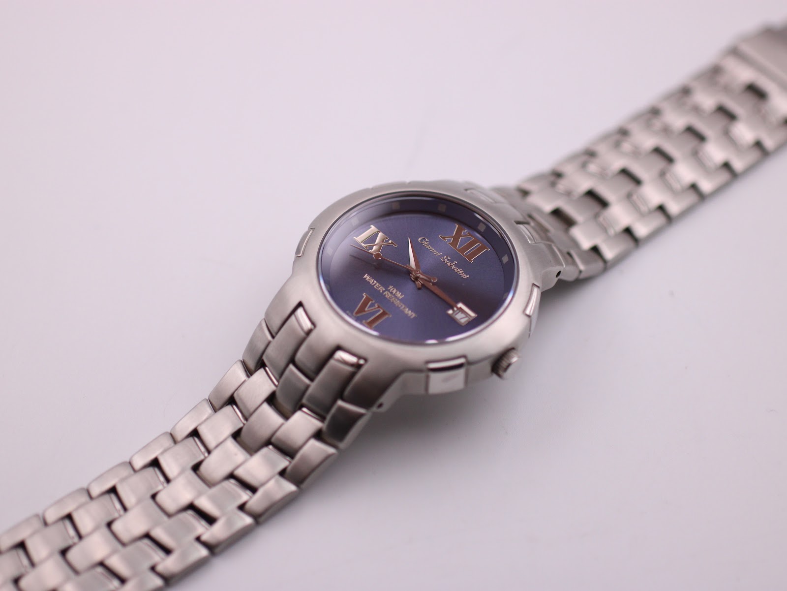 Overhead angled view of the Gianni Sabatini watch with bracelet extended.