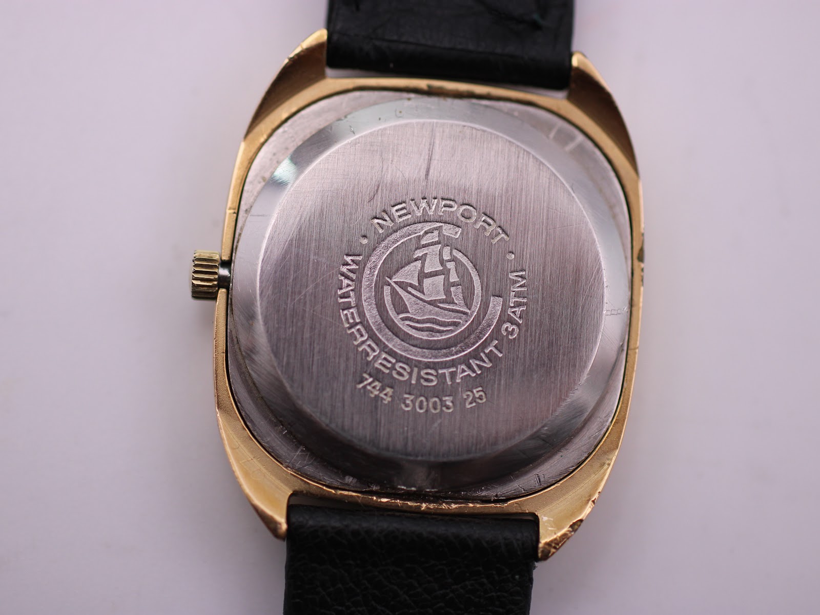 Detailed close-up of the Certina Newport stainless steel case back with "Newport Water Resistant 3 ATM 744 3003 25" engraving.