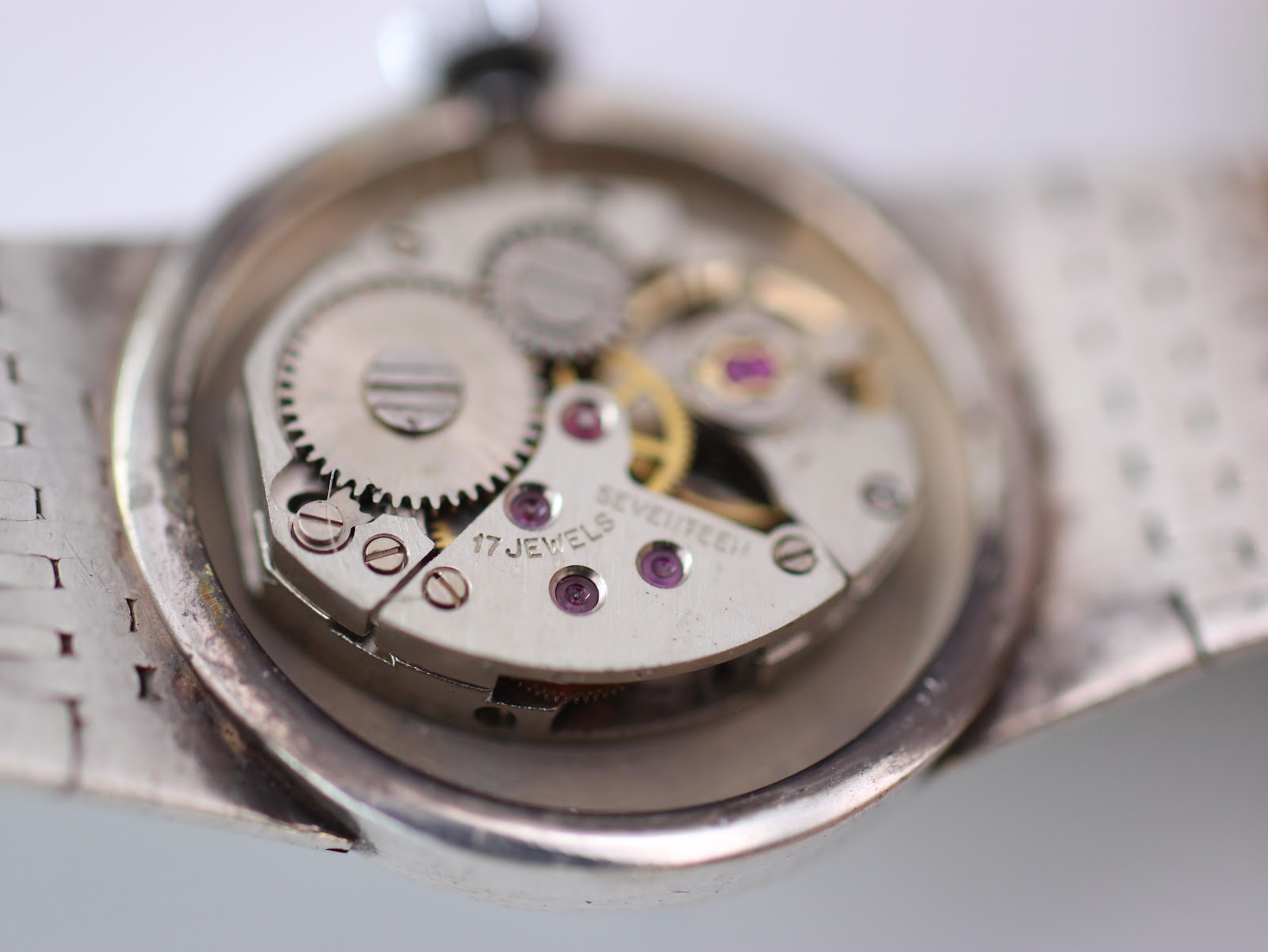 Macro shot of the Jesty manual wind movement, showing 'SEVENTEEN 17 JEWELS'.