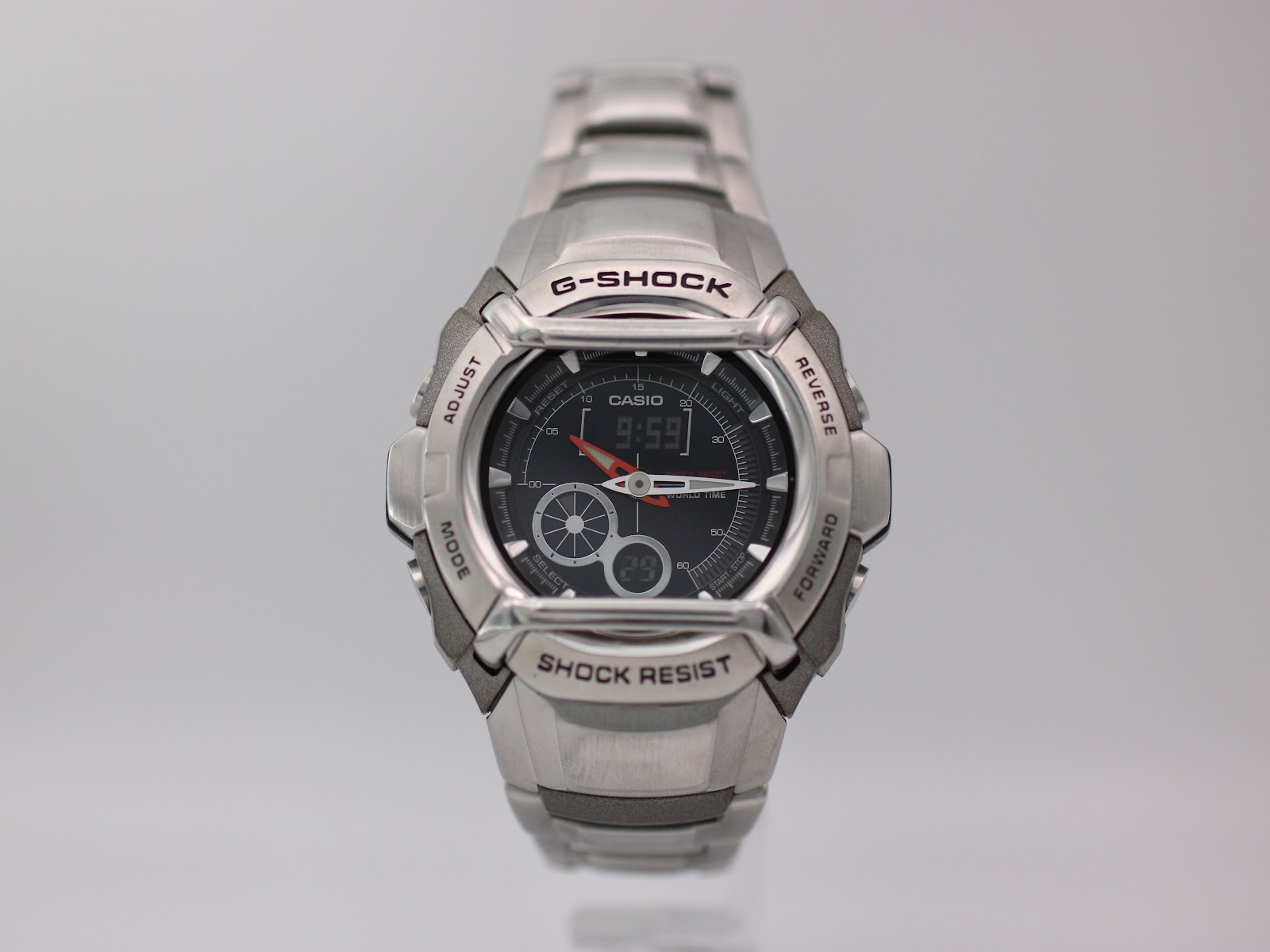 Front view of Casio G-Shock G-510D ana-digi watch with black dial and silver stainless steel case and bracelet.