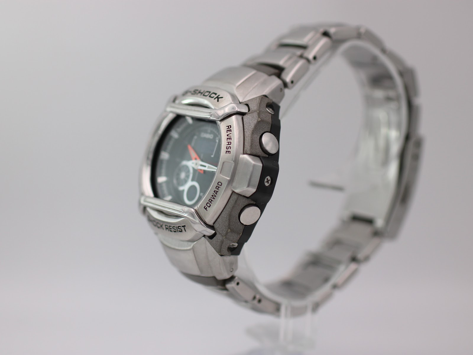 Angled side view of the Casio G-Shock G-510D, showing grey resin side accents and silver bracelet.