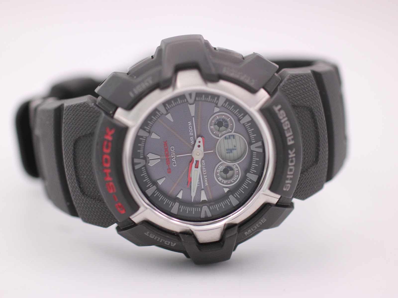 Slightly angled front view of the Casio G-Shock GW-1500A dial, highlighting the digital sub-dials and red accents.