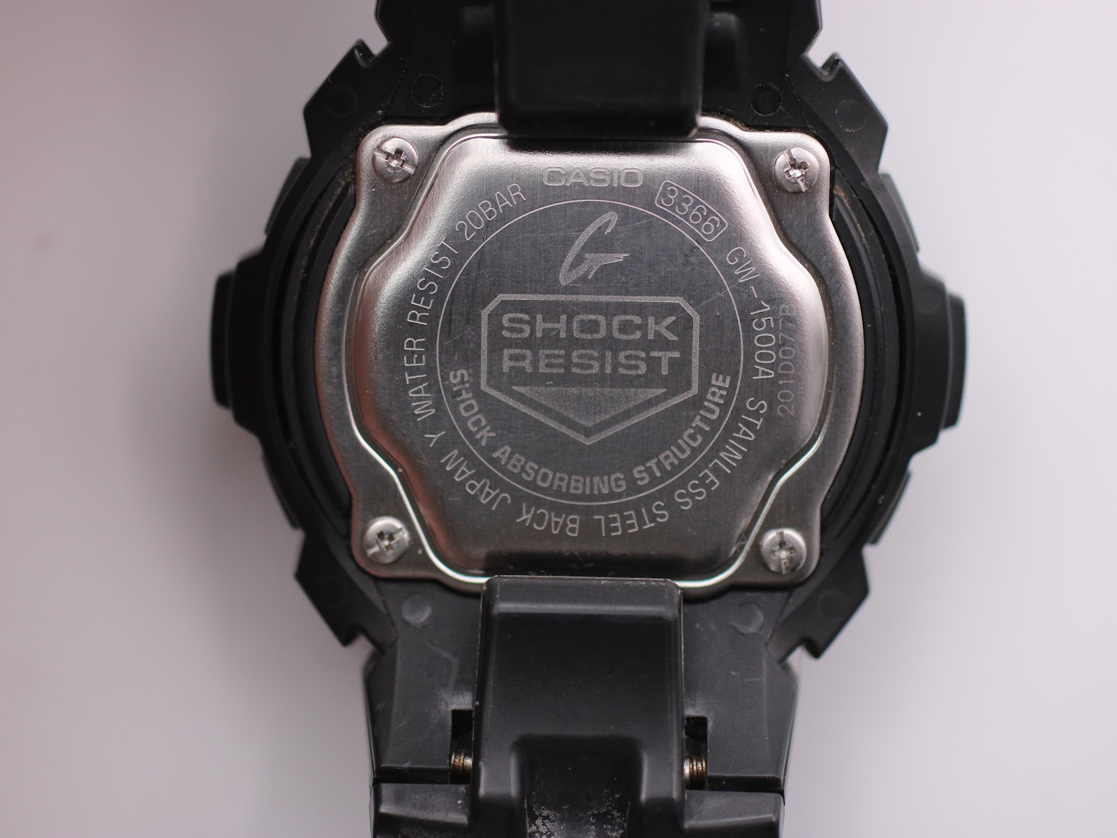 Rear view of the watch, showing the stainless steel case back with 'shock resist', 'water resist 20bar', 'GW-1500A' and '3368' engravings.