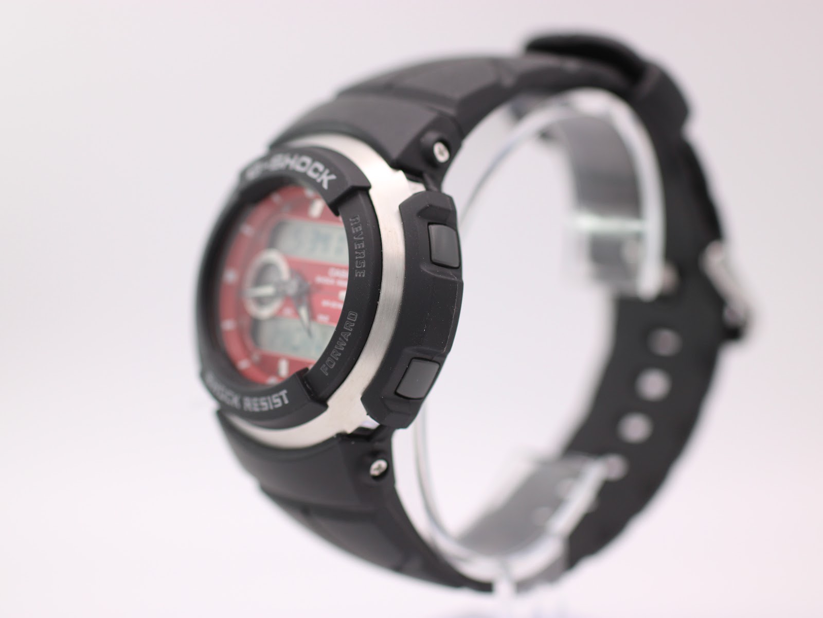 Right-side angled view of Casio G-Shock G-300 watch, highlighting the black resin case, stainless steel bezel, and control buttons.