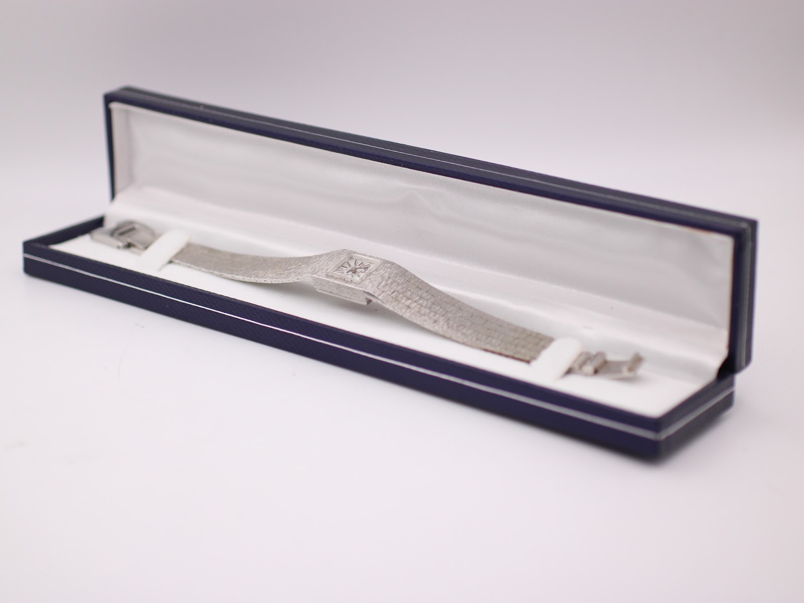 Regency watch displayed in a blue presentation box, showing the full length of the watch.