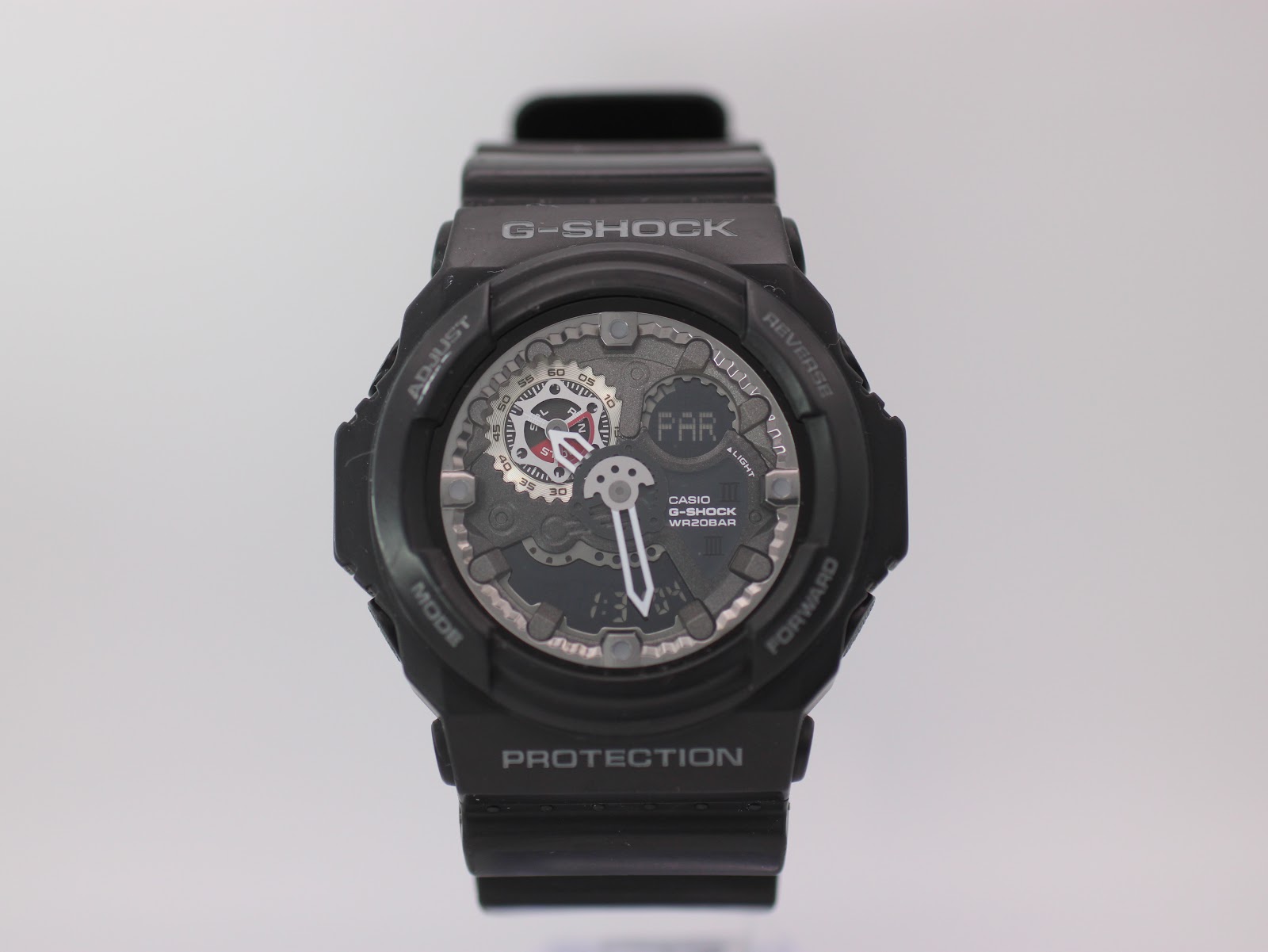 Front view of black G-SHOCK GA-300 ana-digi watch with skeletonised black dial and white hands.
