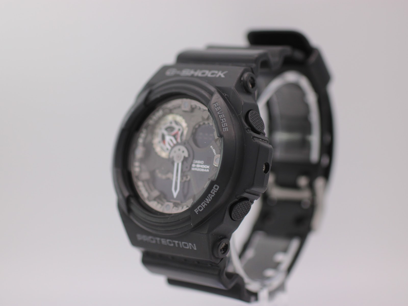 Three-quarter view of black G-SHOCK GA-300 watch from the right, showing side buttons and robust resin case.
