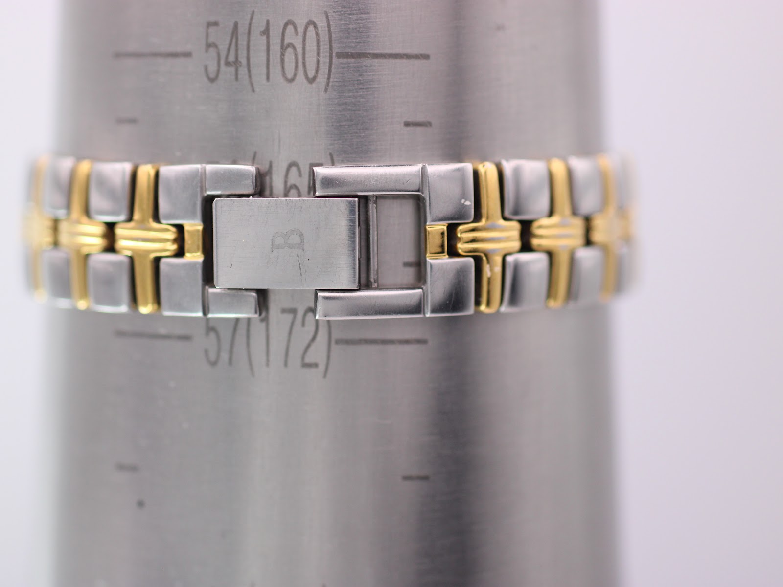 The Bulova bracelet closed on a wrist sizing mandrel, indicating a wrist circumference of approximately 172mm / 17.2cm.