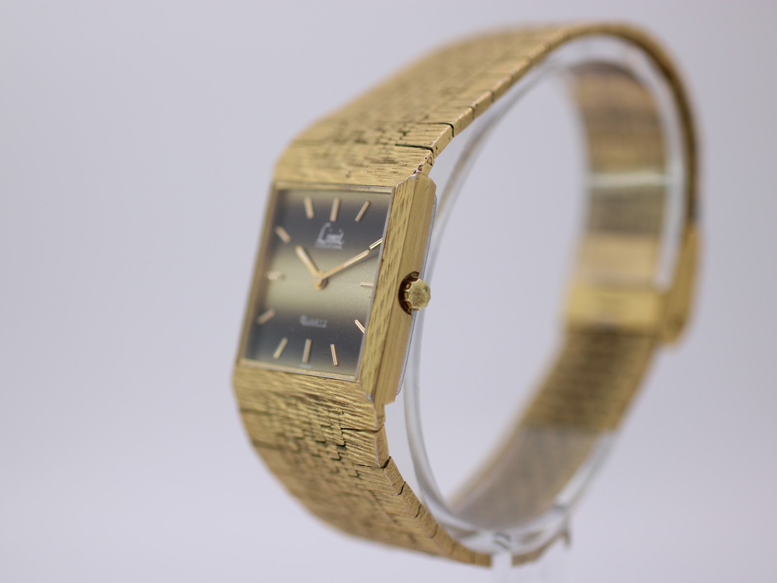 Limit International tiger eye ombre quartz watch, 18K gold filled, gold bark textured bracelet, 1970s vintage photo 2
