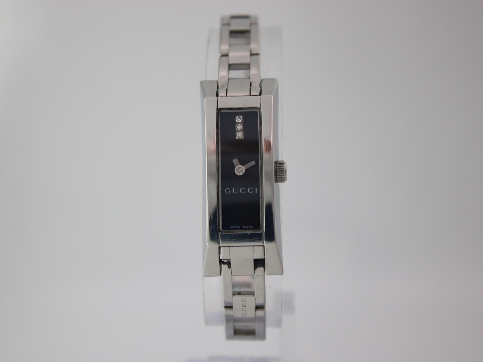 Gucci 110 rectangular black dial quartz watch with diamond