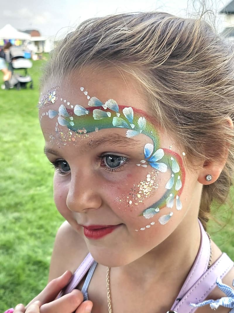 Colourful face-painting design by Sue