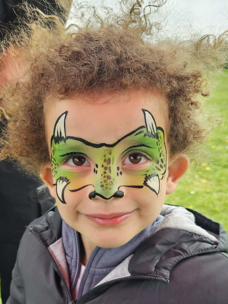 Fun face paint design by Sue