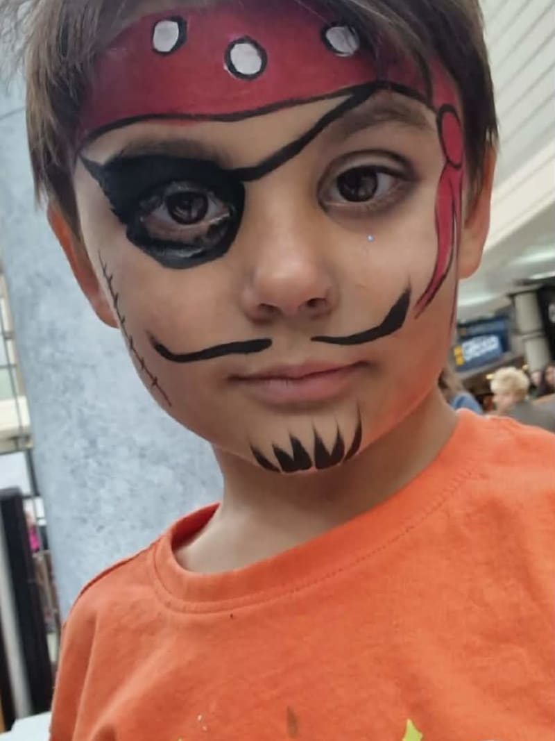Colourful face-painting design by Sue